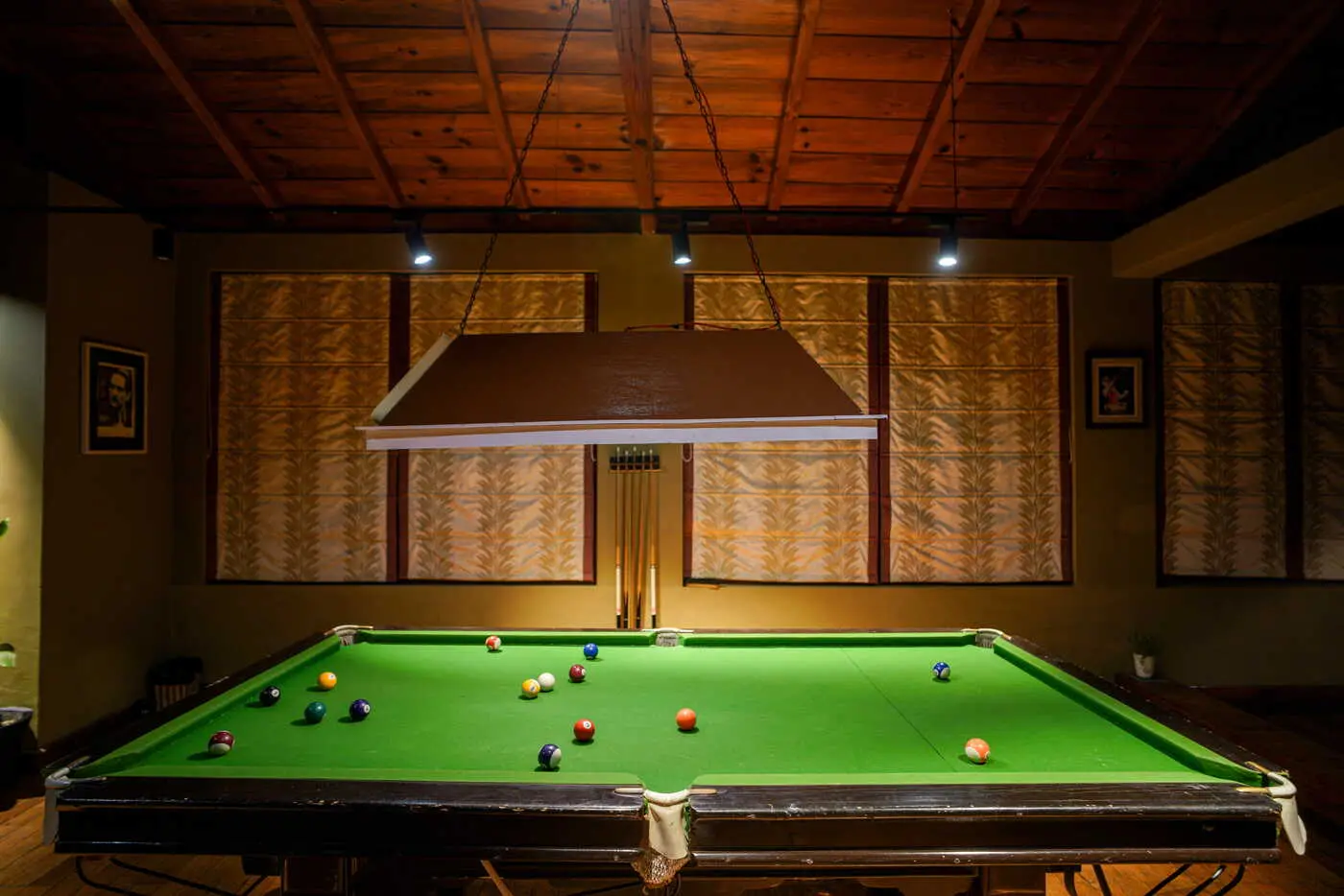 Games cottage glowing at night on the Two Chimneys estate, Gethia